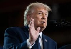 Trump defends tariffs in Michigan as new legal challenge advances